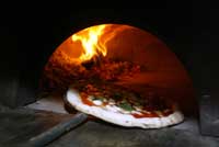 Pizza in formo (foto dell'Associazione verace Pizza napoletana)